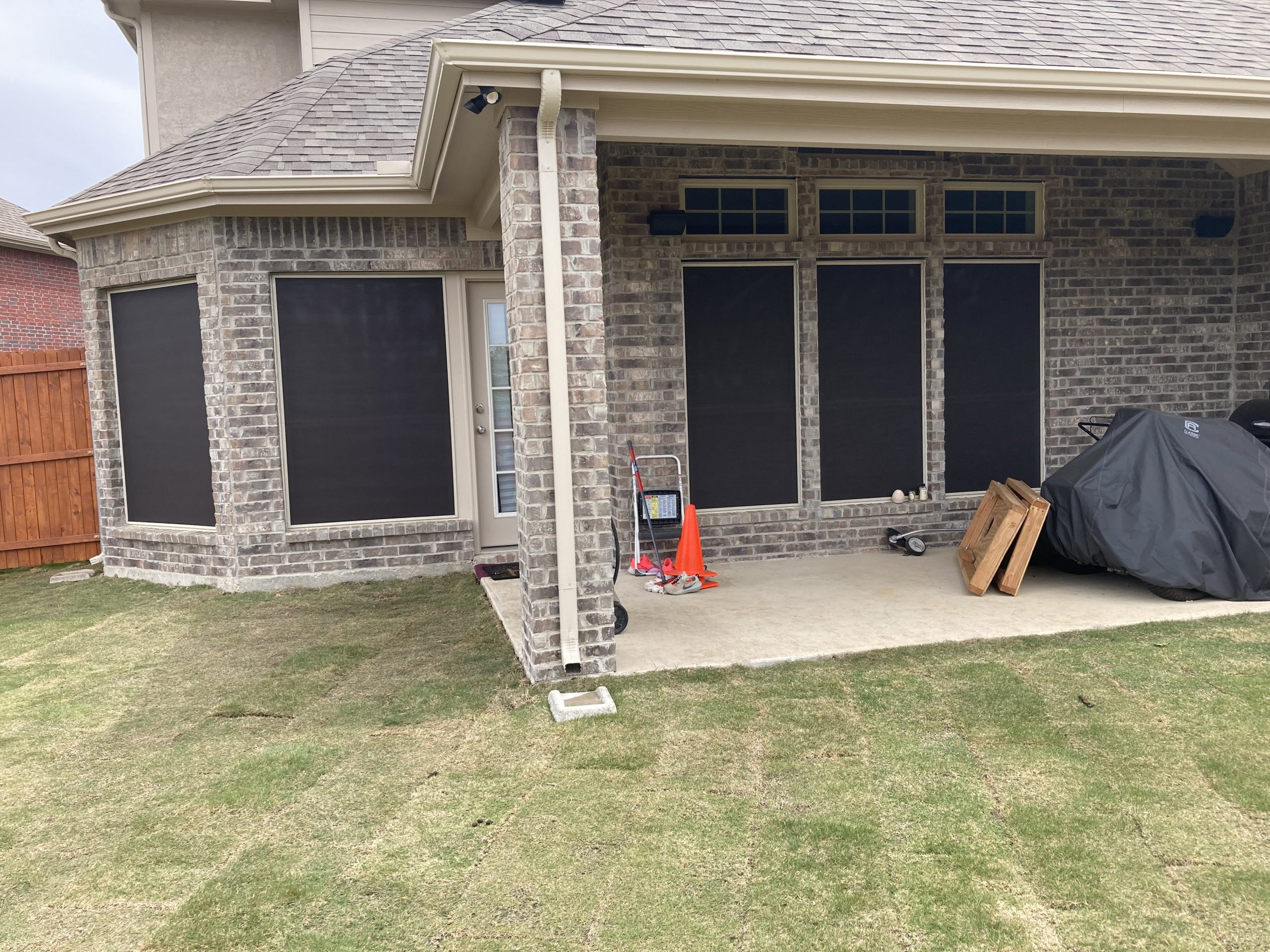 Patio solar screens on a residential home